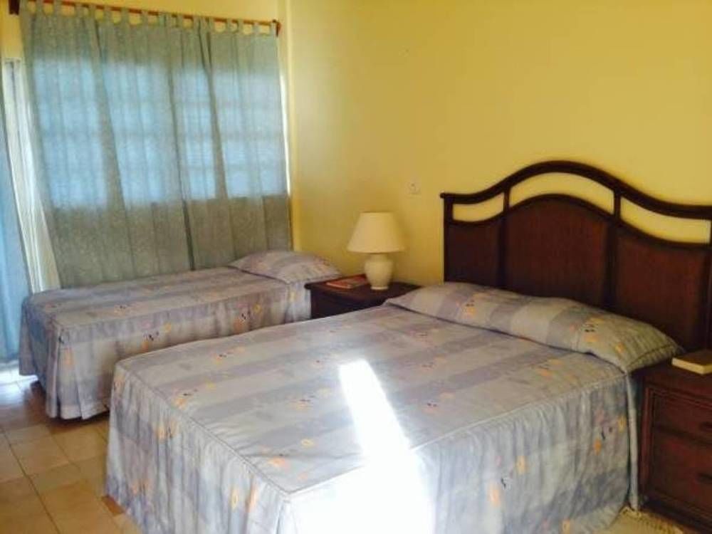 Kings Landing Hotel Clifton Bagian luar foto